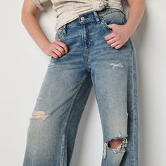 Add a trendy denim style to your collection with this low-rise pair from Arizona's junior's and women's collection. Designed for a loose, baggy-fit, these jeans are made from structured cotton and recycled material with a classic button-zip fly and 5-pocket tailoring.Features: RippedClosure Type: Button & ZipperPockets: 1 Front Coin Pocket, 2 Front Slip Pockets, 2 Back Slip PocketsRise: Low RiseFiber Content: 64% Cotton, 31% Tencel Lyocell, 5% Recycled CottonFabric Description: DenimInseam: 31 … Casual Distressed Flare Jeans In Rigid Denim, Relaxed Fit Distressed Flare Jeans In Medium Wash, Relaxed Fit Distressed Medium Wash Flare Jeans, Trendy Distressed Washed Blue Cropped Jeans, Medium Wash Distressed Flare Jeans With Relaxed Fit, Medium Wash Relaxed Fit Distressed Flare Jeans, Trendy Washed Blue Distressed Cropped Jeans, Casual Distressed Flare Jeans, Casual High Rise Distressed Jeans