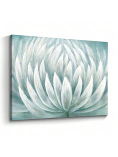 a white flower on a green background is featured in this canvas art print, which has been