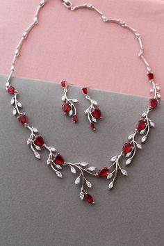 Wedding jewelry set Prom jewellery Color: rhodium-silver tone/clear/red Measurements: earrings approx 3.6 cm,width approx 12 mm( very delicate earrings not long). necklace approx 17.5 inches Materials: rhodium over brass findings, clear/red zirconia crystals. PACKAGING:simple as in stock at this moment. WEDDING JEWELRY: https://www.etsy.com/uk/shop/WeddingJewelryOutlet?ref=seller-platform-mcnav&section_id=26786154 WEDDING HEADPIECE: https://www.etsy.com/uk/shop/WeddingJewelryOutlet?ref=simple-sh Red And White Jewelry, Christmas Wedding Jewelry, Silver Jewellery Prom, Ruby Jewelry Silver, Jewelry For Red Dress, 2024 Jewelry Trend, Red And Silver Jewelry, Red Wedding Jewelry, Crystals Packaging