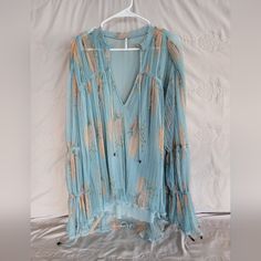 Questions? Leave A Comment Below! Light Blue Long Sleeve Bohemian Blouse, Light Blue Bohemian Top For Fall, Light Blue Bohemian Blouse With Floral Print, Light Blue Bohemian V-neck Blouse, Bohemian Light Blue Floral Print Blouse, Floral Shirt, Blue Cream, Leave A Comment, Free People Tops