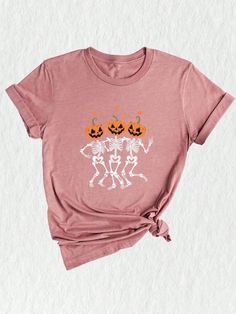 Embrace the spirit of Halloween with our versatile Halloween Shirt, designed for those who love the spooky season. This Ghost Shirt features a playful skeleton graphic, making it perfect for festive gatherings or casual outings. Crafted from soft, breathable fabric, it ensures comfort while showcasing your Halloween spirit. Ideal for layering or wearing on its own, this Halloween Tee is a must-have addition to your fall wardrobe, celebrating the season with style and flair. 1. This Halloween-the Casual Skull Print T-shirt For Halloween, Fall Skull Print Short Sleeve T-shirt, Skull Print Short Sleeve T-shirt For Fall, Short Sleeve T-shirt With Skull Print For Fall, Halloween Skull Print Crew Neck Shirt, Halloween Skull Cotton Shirt, Halloween Fun Skull Print T-shirt, Funny Halloween Tops With Skull Print, Funny Halloween Top With Skull Print