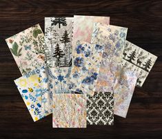 six different types of napkins with trees on them, all in various colors and patterns