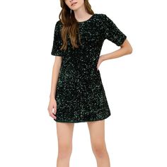 Shine bright this holiday season with the August Sky Women's Back Bow Sequin Mini Dress! Featuring a classic round neckline and short sleeves, this dress takes the simple t-shirt style to a whole new level with sparkling sequins and a statement oversized bow at the back for a feminine touch. With a comfy lined design and just the right amount of stretch, it's perfect for any festive occasion! Fitted Sequin Dress With Crew Neck, Short Sleeve Mini Dress For Holiday Party, Green Short Sleeve Dress For Holiday, Holiday Dresses With Short Sleeves, Sequin Mini Dress With Short Sleeves For Holiday Parties, Green Short Sleeve Mini Dress For Night Out, Green Short Sleeve Mini Dress For Party, Elegant Crew Neck Mini Dress For Party, Casual Crew Neck Sequin Dress