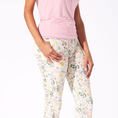 Embrace the crisp autumn vibes with our Fall Floral Bamboo Women's Pajama Set. Featuring a charming floral print in warm hues, these pajamas offer the perfect blend of style and comfort. Made from luxurious bamboo fabric, they're soft, breathable, and eco-friendly. Snuggle up in sustainable fashion this season! Stylish and Functional Top: Scoop neck long-sleeve top with elegant snaps, making it both stylish and convenient for breastfeeding. Practical Pockets: Jogger-style pants with deep pockets Spring Printed Relaxed Fit Sleepwear, Printed Relaxed Fit Sleepwear For Spring, Printed Relaxed Fit Spring Sleepwear, Casual Printed Sleepwear For Spring, Comfortable Cotton Spring Sleepwear, Comfortable Relaxed Fit Sleepwear For Spring, Spring Floral Print Sleepwear, Spring Floral Print Sleepwear For Relaxation, Comfortable Floral Print Sleepwear For Spring