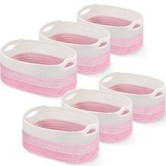 four pink and white baskets with handles