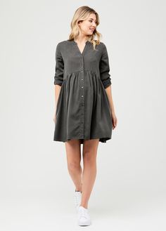 Soft fabric plus slight structure make the perfect laid-back shirt dress. We love features like the cuffed sleeves and curved empire waist that drapes over your bump, plus its versatility for nursing with fully functional buttons. 100% lyocell Cold hand wash separately. Do not bleach, soak, rub, or tumble dry. Dry in shade. Warm iron on reverse side. You may also dry clean. Style runs big — we recommend sizing down Model is 5'10" and wearing size small You deserve to feel like your best self, an Tencel Dress, Pregnancy Stages, Stylish Maternity, Friend Outfits, Shirt Dresses, Dress Silhouette, Maternity Dress, Maternity Fashion, Nordstrom Dresses