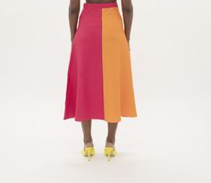 Color blocked A-line skirt with elastic waistband and side zipper. Multicolor Asymmetrical Lined Skirt, A-line Multicolor Lined Skirt, Relaxed Lined Midi Wrap Skirt, Relaxed Lined Asymmetrical Wrap Skirt, Multicolor A-line Bottoms With Lined Skirt, Multicolor A-line Lined Skirt, Relaxed Midi Wrap Skirt With Lining, Color Block Skirt For Summer, Spring Color Block Skirt