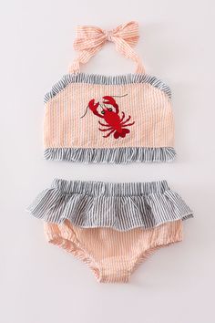 DESCRIPTION Get your little one ready for a stylish swim with our orange seersucker 2pc swimsuit featuring a playful lobster embroidery. Perfect for a day at the beach or by the pool, this suit will have your little girl looking adorable and feeling comfortable. 🦞 Cotton is generally considered a good choice for baby skin for several reasons: Softness: Cotton fabric is naturally soft and gentle against the skin. Breathability: Cotton is highly breathable and allows air to circulate, helping to Mommy Energy, Lobster Embroidery, Swim 2024, Sequin Crafts, Kids Swim, Plaid And Leopard, Pajama Romper, Bleach Product, Sports Shorts Women