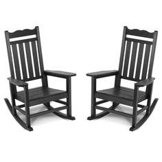 two black rocking chairs sitting next to each other