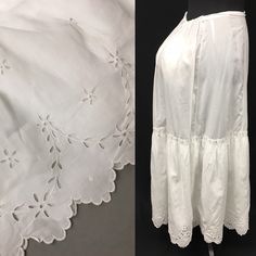 "1890s M Victorian Cotton Bustle Petticoat - White Cotton broadcloth - baby flat felled seams - blue cross stitch marks front waist - Adjustable waistband to allow for bustle room, twill tape ties - waist darts - Closes with 3 metal buttons covered in fabric (1 missing) - White Eyelet scallop embroidery - Beading insertion lace divides top skirt from shirred hem - 2 layers of fabric in embroidered panels at hem Wearable condition, noted flaws below: - top button fabric is tearing, missing bottom Blue Cross Stitch, Insertion Lace, Scallop Embroidery, High Neck Lace Dress, Embroidery Beading, Flat Felled Seam, Blue Cross, Bride Photo, Adjustable Waistband