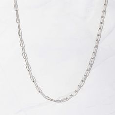 Very trendy at the moment - paperclip necklace. It's dainty and great layered or alone. Made of 925 Sterling Silver Plated in a THICK plating of 14k Gold for a piece that will last you years to come 16" Chain + 2.5" Extension chain Lobster Clasp Closure Nickel-free and hypoallergenic Thickness: 3.7mm Dainty Paperclip Chain Link Charm Necklaces, Dainty Paperclip Chain Link Charm Necklace, Dainty Charm Necklaces With Paperclip Chain, Dainty Sterling Silver Charm Necklaces With Paperclip Chain, Dainty Sterling Silver Charm Necklace With Paperclip Chain, Elegant Sterling Silver Charm Necklace With Paperclip Chain, White Gold Sterling Silver Paperclip Necklace, Sterling Silver Paperclip Necklace For Everyday, Minimalist Sterling Silver Paperclip Necklace