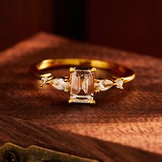 a close up of a ring on a wooden surface