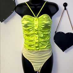 Pretty Little Things Neon Green Bodysuit Size Small Medium Adjustable Strap Cross Cross In Front Very Stretchy Material Buttons Up From The Bottom So If You Want It To Be Open You Can Wear It Like That New With Tag Trendy High Waist Summer Bodysuit, Summer High Waist Bodysuit For Party, Stretch Bodysuit For Summer Party, Summer Party Bodysuit With Stretch, High Waist Summer Bodysuit For Party, Summer Party High Waist Bodysuit, Green Swimwear For Summer Night Out, Green Summer Swimwear For Night Out, Spring Party One-piece Bodysuit