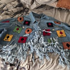 Handmade African Denim Jacket Multicolor Denim Outerwear With Patches, Trendy Patchwork Dark Wash Outerwear, Trendy Dark Wash Patchwork Outerwear, Multicolor Denim Jacket For Fall, Fall Multicolor Denim Jacket, Multicolor Denim Winter Outerwear, Trendy Blue Outerwear With Patches, Blue Spring Outerwear With Patches, Spring Blue Outerwear With Patches