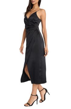 This figure-flaunting midi dress fashioned with a faux wrap front is topped with rhinestone adorned straps for a show-stopping look. 40 1/4" length (size Small) V-neck Spaghetti straps Lined 98% polyester, 2% spandex Dry clean Imported Bold Lip, Midi Wrap Dress, Illusion Dress, Wrap Midi Dress, Maggy London, Flowing Skirt, Morganite, Fitted Bodice, Fit & Flare