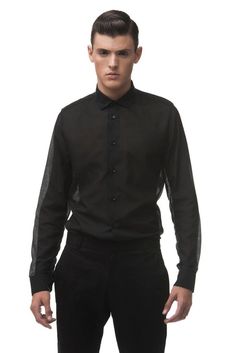 A minimal semi sheer black cotton-silk shirt by ARIEL BASSAN.ARIEL BASSAN is a sophisticated and contemporary menswear brand, that offers a unique and fresh high quality garments with a distinct signature of modern minimalism.This shirt is made out of a 30% Silk and 70% Cotton, Semi Sheer, Soft Woven Fabric.Model's height is 183cm/6'0'' and he wears size M.-----------------------------------------------------••• Have a question about this item? •••••••  Don't hesitate and contact us!  •••••----- Sheer Outfit, Black Lace Shirt, Mens Dress Shirts, Man Clothing, Sheer Shirt, Modern Minimalism, Mens Dress, Contrast Collar, Tailored Shirts