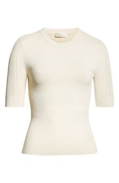 Intricate pointelle stitching defines the sleeves, neckline and sides of this ultrasoft top. Crewneck Short sleeves 63% viscose, 36% nylon, 1% elastane Dry clean Imported Beige Stretch Pointelle Knit Top, Spring Feminine Fitted Knit Top, Feminine Fitted Textured Knit Top, Feminine Fitted Knit Top For Spring, Fitted Feminine Textured Knit Top, Feminine Fitted Knit Top, Fitted Feminine Knit Sweater, Cream Fine Knit Tops For Layering, White Fitted Knit Top For Fall