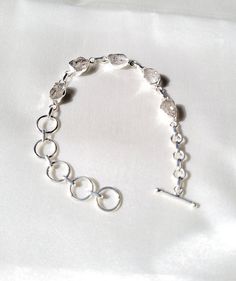 Item specifics ( 100 % Natural Gemstone Jewelry ) Gemstone  Herkimer Diamond Shape  Rough  Jewelry Type  Silver Bracelets Purity  925 Sterling Silver  Quantity  1 Pieces Handmade Designer Silver Jewelry                                                                                                                Description                                                                                                       STAMPED 925 STERLING SILVER ? This beautiful Item is made from the fines Adjustable Faceted Sterling Silver Bracelet, Adjustable Silver Crystal Bracelet With Stones, Silver Gemstone Crystal Bracelet, Sterling Silver Bracelets With Stones, Silver Sterling Silver Bracelet With Stones, Sterling Silver Bracelet With Stones, Silver Faceted Bangle Bracelet, Silver Faceted Bangle Bracelets, Faceted Silver Bracelet