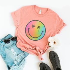 Looking for a cute versatile top to wear? Make sure to grab one of our Graphic tees! This soft and comfortable graphic tee is the perfect top for any outfit. It can be paired with biker shorts, jeans, or even a simple skirt/dress! This tee is true-to-size, so be sure to order your regular t-shirt size! If you are looking for a more oversized look, make sure to size up! Trendy Tops With Funny Print And Comfortable Fit, Fun Crew Neck T-shirt For Loungewear, Trendy Comfortable T-shirt Soft-washed, Pink T-shirt With Funny Print For Everyday Wear, Trendy Comfortable Soft-washed T-shirt, Trendy Comfortable Fit Soft-washed T-shirt, Trendy Comfort Fit Soft-washed T-shirt, Cute Soft-washed Relaxed Fit T-shirt, Cute Relaxed Fit Soft-washed T-shirt