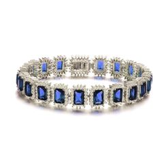 Sterling Silver With Blue Sapphire & Diamond Cubic Zirconia Rectangular Halo Cluster Link Vintage Tennis Bracelet | Genevive Jewelry | Wolf & Badger Diamond And Sapphire Bracelet, Classic Blue Tennis Bracelet For Wedding, Blue Crystal Bracelets For Formal Occasions, Sapphire Cubic Zirconia Tennis Bracelet With Gemstone, Wedding Sapphire Diamond Bracelet With 17 Jewels, Sapphire Tennis Bracelet With Diamond Accents, Blue Sapphire Tennis Bracelet With Gemstone, Blue Sapphire Gemstone Tennis Bracelet, Luxury Sapphire Cubic Zirconia Diamond Bracelet