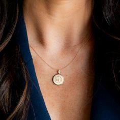 Inspired by vintage coin necklaces, the Sunburst Seal Necklace can be worn layered or alone as a chic statement. Pendant size: 15mm x 15mm x 1.2mm Bail Size: 3mm x 6.6mm Available in Sterling Silver, Cavan Gold, and 14K Gold Everyday Etched Round Pendant Necklaces, Gold Etched Round Disc Jewelry, Everyday Etched Round Pendant Necklace, Minimalist Coin Pendant Medallion Jewelry, Etched Coin-shaped Jewelry Gift, Dainty Jewelry With Round Disc Coin Pendant, Dainty Round Disc Coin Pendant Jewelry, Everyday Jewelry With Coin Pendant, Everyday Round Disc Coin Pendant Jewelry