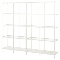 a white shelving unit with four shelves