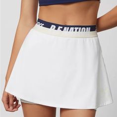 Nwt Urban Outfitters Pe Asics Skirt Size Xs White High Waist Tennis Skirt With Built-in Shorts, Chic White Tennis Skirt With Built-in Shorts, Sporty High-waisted White Skirt, Sporty High Waist White Skirt, White High Waist Sporty Skirt, Sporty White High-waisted Skirt, White Sporty Skirted Bottoms, Sporty White Mini Skirt With Elastic Waistband, White Skirted Bottoms With Built-in Shorts