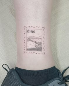 a person's foot with a stamp on it and the word fire written in black ink