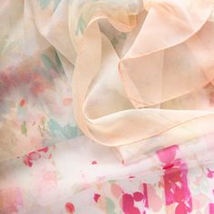 I adore flowers and gardens, and that passion inspired me to create this Silk Georgette Long Scarf. The soft, feminine watercolor flower print on sheer silk georgette is light, airy, and perfect for the woman who cherishes the beauty of Italy and enjoys adding a touch of romance to her wardrobe. This scarf is a beautiful way to carry the essence of a blooming garden with you, wherever you go. Details Figure flattering size: Approx. 20" x 67" (53 x 170cm). Years of trial and error taught us that Elegant Flower-shaped Silk Scarf For Spring, Chic Silk Scarf With Floral Print For Spring, Elegant Flower Shaped Silk Scarf For Spring, Elegant Floral Silk Scarf For Spring, Floral Silk Scarf For Spring, Pink Floral Print Silk Scarf, Summer Floral Print Silk Scarf, White Silk Scarf With Floral Print, Feminine Silk Scarf For Summer