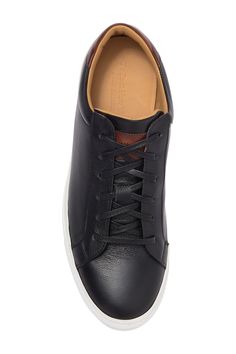 A polished sneaker with a sleek silhouette redefines your everyday looks.Sizing: True to size. M=medium width Casual Leather Cap Toe Sneakers, Leather Cap Toe Sneakers With Textured Sole, Leather Sneakers With Textured Sole And Cap Toe, Leather Lace-up Sneakers For Derby, Classic Low-top Sneakers For Derby, Classic Low-top Sneakers For Casual Wear, Modern Low-top Sneakers For Derby, Leather Cap Toe Sneakers With Rubber Sole, Black Low-top Sneakers For Derby