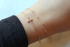 Dainty Bracelet Set, Rose Gold Sideways Cross, Sideway Cross, Dew Drop Bracelet, Dew Drops, Dew Drops Bracelet, Trending Now, Cross Bracelet by laalee on Etsy https://www.etsy.com/listing/558028504/dainty-bracelet-set-rose-gold-sideways Bracelet Trending, Layering Bracelets, Gold Bracelet Simple, White Pearl Jewelry, Bracelet Set Silver, Trending Bracelets, Dainty Bracelet, Dew Drops, Dainty Gold Necklace