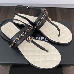 2023 Chanel Cc Logo Black Thong Leather Flat Shoes Sandals Size 37. Brand New In Box With Dust Bag. Luxury Leather Flip Flops For Beach, Luxury Leather Flip Flops With Single Toe Strap, Luxury Black Leather Flip Flops, Elegant Leather Flip Flops With Branded Insole, Luxury Leather Open Toe Flip Flops, Luxury Leather Toe Post T-strap Sandals, Designer Black Leather Flip Flops, Luxury T-strap Sandals For Beach, Designer Black Toe Post Sandals