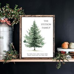 a christmas tree is displayed on a shelf