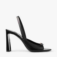 Designed to a modern, graphic silhouette, the Lev sandal is crafted from Nappa leather. Featuring a curved heel, this elevated sandal is complemented by gold-tone Diamond hardware. Graphic Silhouette, Bridal Boots, Shoes Luxury, Sneaker Dress Shoes, Jimmy Choo Shoes, Pumps Flat, Scarf Jewelry, Designer Boots, Mens Fragrance