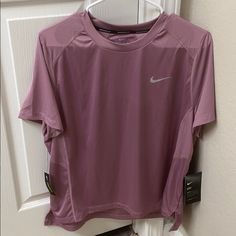 Nike Running Dri-Fit Mauve Color Nike Sporty Purple Top, Purple Crew Neck Workout Top, Nike Purple Tops For Sports, Purple Nike Sporty Top, Nike Sports Tops In Purple, Purple Short Sleeve Top For Workout, Purple Crew Neck Sports Top, Nike Purple Sporty Tops, Nike Dri-fit Breathable Tops