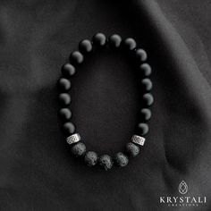 Our elastic Lava Stone bracelet is a piece that radiates grounding and stabilizing energy. This bracelet is a blend of style and a connection to the Earth's energy. Lava Stone is celebrated for its qualities of stability and emotional healing; this bracelet serves to promote one's inner strength and resilience. The Lava Stone is combined with Matte Black Agate for additional grounding, protection, and stability. This bracelet is made with 8 mm beads. For orders of three or more bracelets, these Onyx Bracelets With 8mm Beads For Healing, Lava Bead Bracelet, Lava Stone Bracelet, Bracelet Crystal, Free Bracelet, Crystal Accessories, Agate Bracelet, Lava Bead, Black Agate