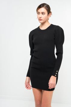 Elevate your style with this chic puff sleeve knit dress. With its elegant and timeless silhouette, this dress is a must-have for any fashion-forward woman. The fitted waist and flared skirt create a figure-flattering look, while the ribbed neckline ensures a comfortable fit. Perfect for any special occasion, this dress will have you looking and feeling your best. Puff shoulder long sleeves Ribbed neckline Fitted silhouette Hand wash cold Do not bleach Do not tumble dry Iron low Shell: 50% Visco Evening Ribbed Mini Sweater Dress, Evening Mini Ribbed Sweater Dress, Chic Fall Puff Sleeve Dress, Fall Fitted Puff Sleeve Dress With Structured Shoulders, Elegant Ribbed Mini Dress For Fall, Elegant Ribbed Mini Length Dress, Chic Winter Puff Sleeve Dress, Chic Winter Mini Dress With Puff Sleeves, Chic Fitted Puff Sleeve Dress For Fall