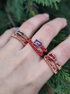 This ring combo is made of 3 handmade wire-wrapped copper rings: - Red agate ring - Purple glass red ring - Abalone shell ring These rings are all adjustable and made from 2 types of copper, raw and varnished. -Tarnish-proof and won't leave green marks on your finger. -To clean, dip the ring for 5 seconds in a mixture of vinegar and salt, then rinse with water and dry well. -suggested not to swim or shower with the rings on regardless. *These rings are sold as a set, you will get all 3 if purchased. Check these listings out: Red agate necklace: https://www.etsy.com/listing/1474737144 Amethyst necklace: https://www.etsy.com/listing/1387983713 Other rings set: https://www.etsy.com/listing/1661783772 Have any questions? Be sure to message me :) Check out my Instagram profile: @bronzaii.jewelr Unique Adjustable Crystal Ring, Unique Adjustable Crystal Ring In Metal, Unique Adjustable Metal Crystal Ring, Adjustable Wire Wrapped Stackable Rings, Red Adjustable Wire Wrapped Rings, Adjustable Copper Wire Wrapped Rings, Adjustable Wire Wrapped Metal Ring, Adjustable Red Wire Wrapped Rings, Adjustable Nickel-free Copper Ring