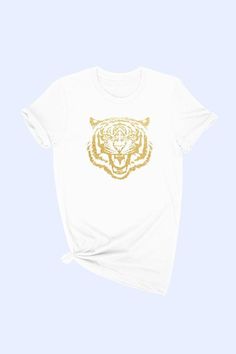 A great staple with a twist, looks great teamed with your favorite coatigan and denim plus booties for an everyday casual take. Gold foil tiger graphic cotton tee. Unisex sizing, premium cotton, classic fit. 100% COTTON Tiger Graphic, Easy Tiger, Ivory Sweater, Tiger's Eye, White Fabric, White Fabrics, Fashion Tops, Gold Foil, Cotton Tee