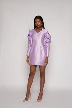 This lovely A-line dress in Lavender is one of the most popular styles, flattering on almost any body shape and type. Simplistic in silhouette, it features eye-catching bow-structured sleeves and a nipped waist for a perfect fit. Its loose design ensures absolute comfort, making it a versatile addition to any wardrobe. Every wardrobe needs the perfect A-line dress for elegance, comfort, and chicness, and this dress ticks all the boxes. Features: *Flattering A-Line Design: Suitable for almost any body shape and type. *Gorgeous Lavender Color: Adds a touch of sophistication and charm. *Bow-Structured Sleeves: Unique and eye-catching, adding a stylish flair. *Nipped Waist: Enhances your figure with a flattering fit. *Comfortable Loose Fit: Ensures all-day comfort. *Versatile Style Perfect for Summer Lavender, Midi Outfits, Midi Dress Chic, Lavender Dress, Dress Bow, Lavender Dresses, Dress A Line, Dress Satin, Satin Midi Dress