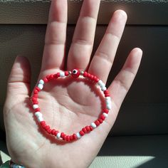 Red Evil eye bracelet Red Round Beads Bracelet For Everyday, Red Bangle Bracelet For Everyday, Trendy Red Beaded Bangle Bracelets, Red Everyday Bangle Bracelets, Everyday Red Bangle Bracelets, Handmade Red Bracelets For Everyday, Trendy Red Bracelets For Everyday, Casual Red Wristband With Round Beads, Red Letter Beads Bracelets For Everyday