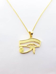 Eye of Horus Gold Necklace, 14k Gold Vermeil Over Sterling Silver Eye Necklace, Egyptian Jewelry.Eye of Horus, in ancient Egypt, a symbol representing protection, health, and restoration.According to Egyptian myth, Horus lost his left eye in a struggle with Seth. The eye was magically restored by Hathor, and this restoration came to symbolize the process of making whole and healing. For this reason, the symbol was often used in amulets.• Material: Eye Of Horus necklace is handcrafted using premi Ancient Style Engraved Yellow Gold Necklaces, Gold Ancient Style Engraved Necklace, Ancient Style Gold Engraved Necklace, Ancient Style Engraved Gold Necklace, Symbolic 14k Stamped Pendant Necklace, Symbolic 14k Stamped Pendant Jewelry, Ancient Gold Pendant Jewelry, Ancient Style Gold Pendant Jewelry, Symbolic 14k Gold Necklaces