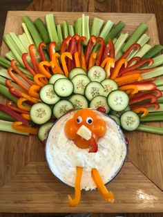 a turkey made out of carrots, cucumbers and celery