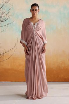 Pink draped kaftan with resham embroidered floral motifs, embellished by beads and sequins. - Aza Fashions Bollywood Draped Dress For Eid, Eid Bollywood Draped Dress, Draped Dress With Zari Work For Eid, Eid Dresses With Zari Work And Draped Shape, Eid Dress With Draped Zari Work, Elegant Draped Kaftan With Draped Sleeves, Eid Zari Work Draped Dress, Elegant Draped Dress With Resham Embroidery, Draped Dress For Eid Reception