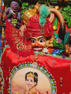 an elaborately decorated mask is displayed on display