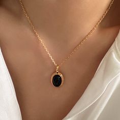 "Elevate your style with our exquisite Oval Black Onyx Pendant/Charm - a versatile Black Onyx necklace designed to effortlessly combine elegance and sophistication. This stunning piece offers three chain options: the edgy Satellite Chain, the timeless Classic Link Chain, or the elegant Pearls Chain. Whether you prefer a Minimalist, Dainty, or classic look, this pendant accommodates various styles, making it a true fashion chameleon Searching for the perfect gift for her? Look no further. This Oval Black Onyx Pendant/Charm combines different styles in one elegant piece, making it an ideal gift choice. Whether you're treating yourself or surprising a loved one, this necklace is sure to impress. DETAILED DESCRIPTION// Material: 925 sterling silver filled 18k gold Stone: natural black onyx Pen Luxury Onyx Jewelry For Women, Luxury Timeless Onyx Jewelry, Luxury Elegant Onyx Necklace, Black Gold Necklace, Black Onyx Pendant, Onyx Pendant, Black Onyx Necklace, Onyx Necklace, For Her Gifts