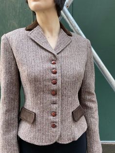 Pierre Cardin wool tweed jacket w/ brown velvet collar and pockets (for show), includes 7 leather buttons, 3 buttons on either sleeve,Lining adorned with the iconic logo throughout. Shoulder 15, B 17, Waist 15, Length 19, Sleeves 22. Fantastic condition! Etsy Shipping -Vintage and pre-owned items may have signs of wear and use and are offered as is. Traces of age and use are therefore completely normal and do not constitute defects. Please see pictures as they are part of the item description an Tailored Single Breasted Long Sleeve Tweed Jacket, Tailored Fall Blazer With Buttons, Classic Tweed Jacket With Lapel Collar And Double Button, Workwear Tweed Jacket With Lapel Collar And Button Cuffs, Tweed Notch Lapel Jacket With Button Cuffs For Work, Notch Lapel Tweed Jacket With Button Cuffs For Work, Notch Lapel Sport Coat With Buttons For Fall, Brown Blazer With Buttons And Lapel Collar, Fall Sport Coat With Notch Lapel And Buttons