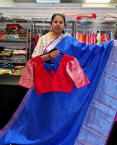 Discover timeless elegance with the Exquisite Blue Luxe Kanjivaram Saree, exclusively at Anandi Fashions. Woven with meticulous craftsmanship, this saree epitomizes luxury and tradition, perfect for any special occasion. At Anandi Fashions, we pride ourselves on offering a wide range of Indian ethnic wear, including sarees, blouses, kurtis, Ghagra choli, lehenga, and artificial jewelry. Embrace the beauty of Indian culture with a piece that stands out for its quality and sophistication. Enhance your wardrobe with this stunning Kanjivaram Saree and experience the unparalleled charm it brings. Artificial Jewelry, Ghagra Choli, Indian Culture, Kanjivaram Sarees, Indian Ethnic Wear, Ethnic Wear, Lehenga, Clothing Items, Timeless Elegance