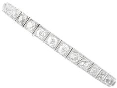 A stunning, fine and impressive antique Old cut 7.85 carat diamond and 18 karat white gold, palladium set bracelet; part of our diverse antique diamond bracelets collection. This stunning, fine and impressive antique diamond bracelet has been crafted in 18k white gold with a palladium setting. This impressive antique bracelet is composed with nineteen Old European round cut diamonds, totalling 7.85cts, individually pavé set to millegrain decorated square links. The bracelet secures with a push fit clasp to the reverse via a fully articulated, expandable spring-loaded strap composed of elongated links. The bracelet benefits from an additional hinged security catch and safety chain. The side of the bracelet strap is hallmarked with the 18k gold mark (18ct) and has been independently tested u Bracelets Collection, Expandable Bracelet, Set Bracelet, Antique Bracelets, White Gold Bracelet, Wedding Jewelry Bracelets, Safety Chain, Antique Diamond, Bracelet Collection