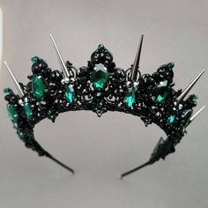 Crowns from the Exclusive Wedding Shop are always: * unique author's design * stunning detail * 100% handiwork * light weight for comfortable wearing * quality materials * large assortment for any occasion Luxurious black tiara. Made of black light metal and crystal and beads. This design of a black crystal tiara will ideally look like a wedding crown, a crown for an adult birthday, for a party of Heloween, for a Goth wedding. The crown height in the center is about 2 inches. Earrings length 2.3 Crown Emerald Green, Emerald Green Tiara, Black Quinceanera Theme, Crown Emerald, Slytherin Wedding, Emerald Crown, Green Tiara, Emerald Tiara, Emerald Green Wedding Theme